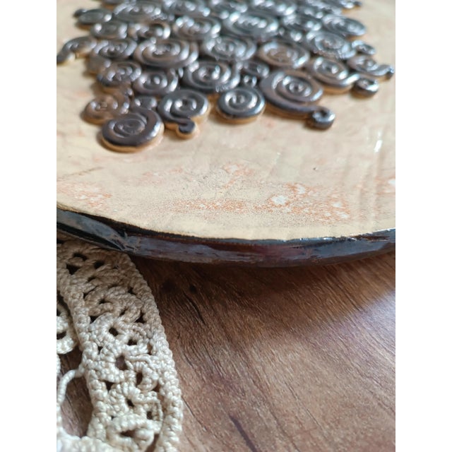 Plate/tray. Suitable as a candle holder or object holder. The piece is entirely handcrafted; the first firing (first...