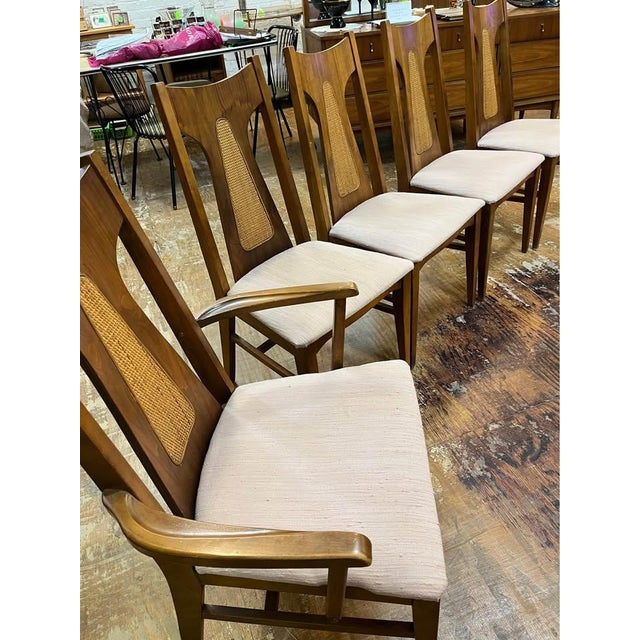 DESCRIPTION: A beautiful set of five vintage Mid-Century Modern dining chairs attributed to Garrison Furniture. This set...