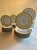 An elegant 46- piece porcelain dinner service in Richard Ginori’s celebrated “Impero Yellow” pattern — the storied Italian...