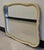 A Mid Century French Provincial Style Cream Painted Frame Wall Mirror. Measures 40" in width, 2" in depth and stands 30"...