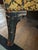 Offered is a striking 1940s/1950s throne-height wingback chair with a matching claw-foot ottoman. Passed down from the...
