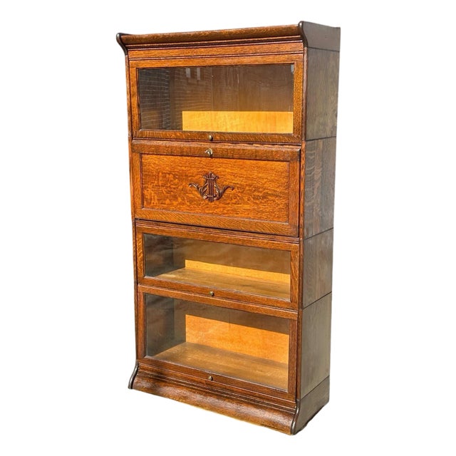 Antique Arts & Crafts Four Section Tiger Oak Lyre Carved Barrister Bookcase For Sale