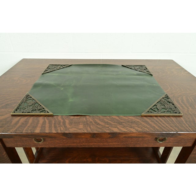 A gorgeous set of four Art Deco or Arts & Crafts period bronze "Grapevine" pattern blotter corners with green leather desk...