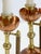 A striking pair of Arts and Crafts candlesticks by Benham & Froud, England, circa 1880, based on a design associated with...