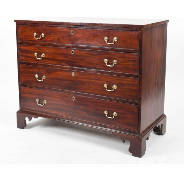A fine American Federal period chest of drawers dating to approximately 1795–1810, reflecting the transition from late...