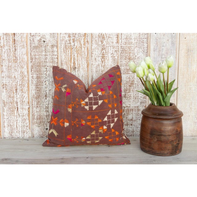This colorful and luxurious Bagh Phulkari pillow features beautiful hand-done silk embroidery on top of a cotton fabric....