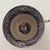 This is an antique black transferware porcelain teacup, produced during the 19th century. Classical transferware featuring...