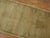 Narrow and long tone on tone Turkish Oushak runner. Small hints of green that can barely be seen, circa mid-20th century,...