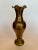 A French provincial style feminine form of a delicate scalloped top rim, a curved body enhances this solid brass vase. The...
