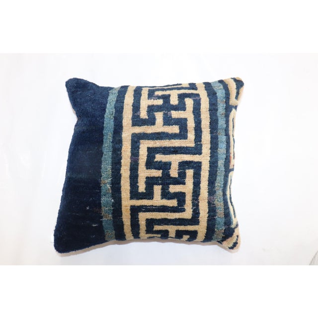 Pillow made from a border of an early 20th century Chinese Rug