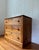 Late 19th century English country chest of drawers in oak and pine features 3 drawers with wooden escutcheons in original...