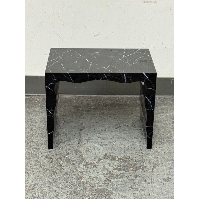 Design Plus Gallery presents a Foster Bench/Side Table from Made Goods. Constructed from wood and painted with a faux...