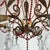 Antique chandelier with red crystals, made of wrought iron and lacquered, decorated with red and clear crystals. Five...