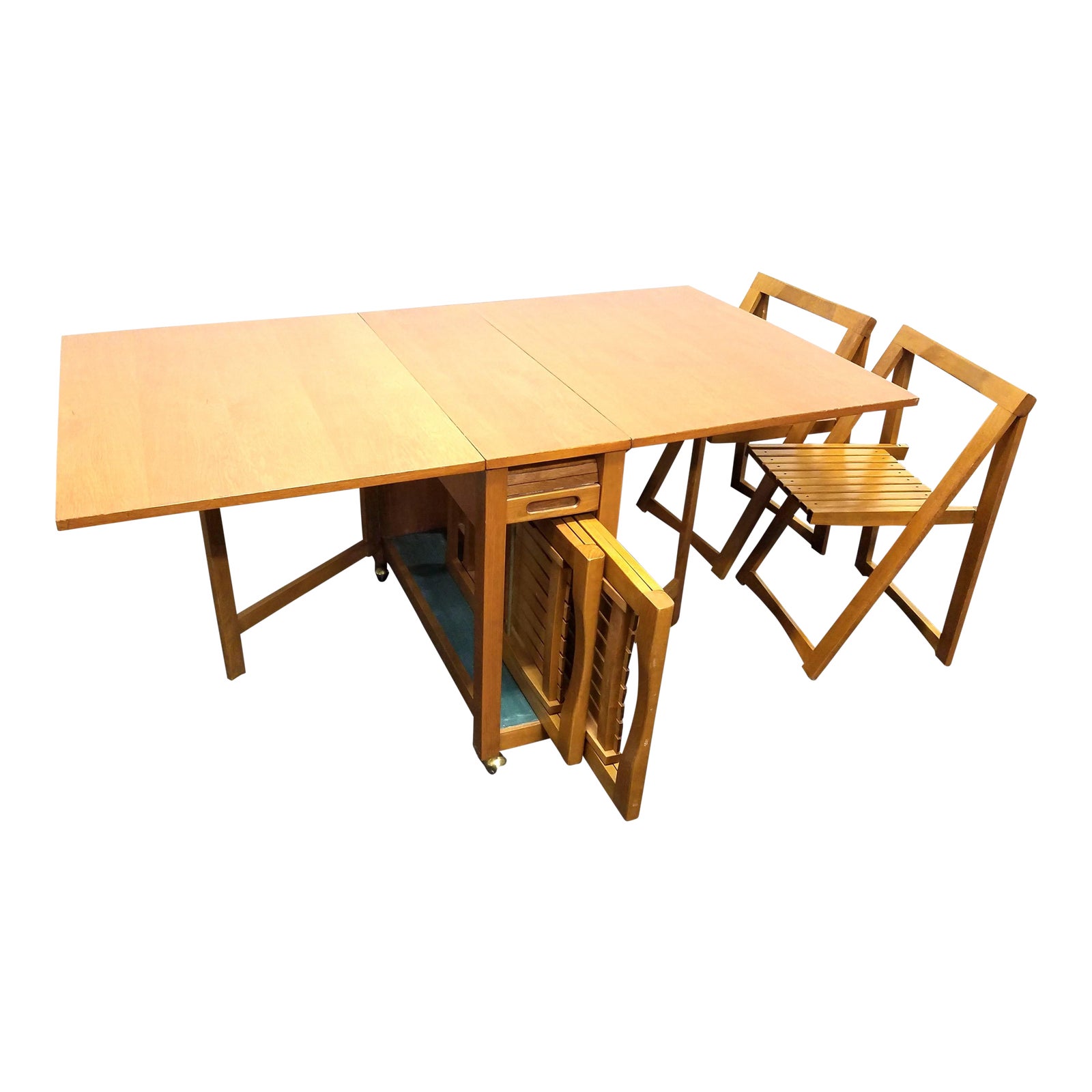 Vintage Mid Century Modern Drop Leaf Table With Chairs And Storage Set Chairish This way, you can keep things like salt and pepper shakers or candle sticks on the table, even when it's folded down. vintage mid century modern drop leaf table with chairs and storage set