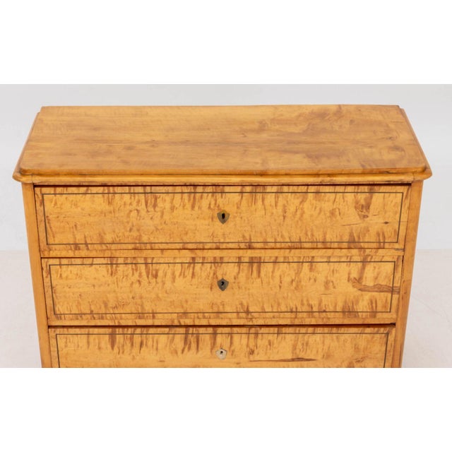 Swedish Birch Chest of Drawers, with three drawers on bracket feet. 35.25" H x 45.5" W x 18" D. Provenance: From a New...