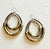 Vintage boho chic statement earrings featuring nested double hoop forms in antiqued mixed metals and patinated silver tone...