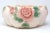 A vintage, hand-painted ceramic planter, with embossed roses on each side. Good vintage condition; minor wear/chipping -...