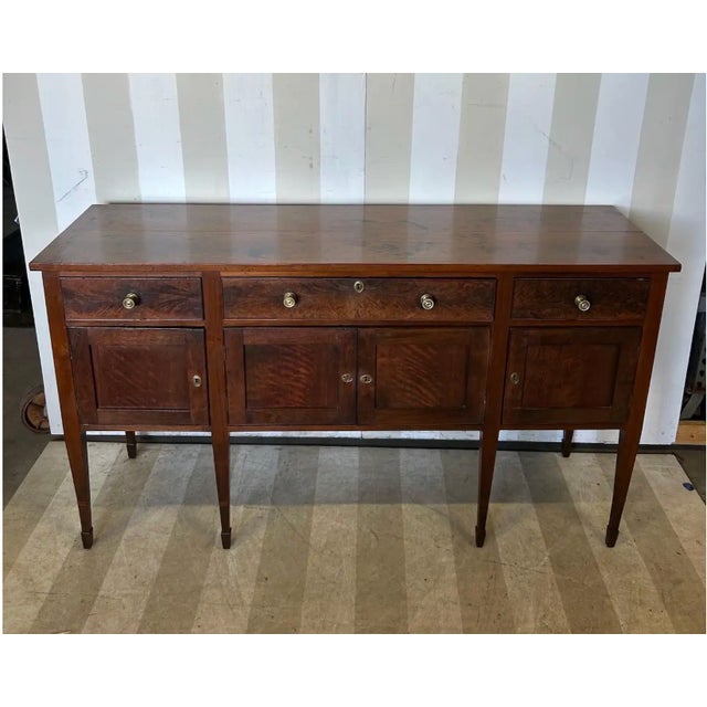 Gorgeous late 18th-early 19th century virginia walnut sideboard with inlaid cuffs and highly figured timbers. Choice of...
