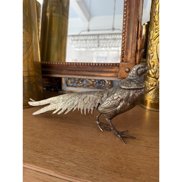 A beautifully sculpted pair of antique French pheasants, notable for their generous scale and exceptional detail. Cast in...
