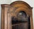 This elegant Vintage French Oak Corner Bookcase is a charming space-saving display cabinet that combines practical storage...
