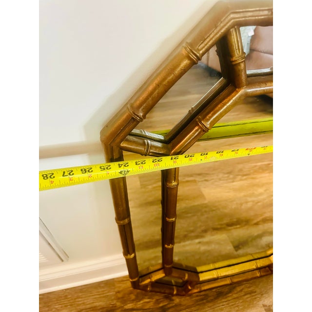 Vintage Hollywood Regency Gold Faux Bamboo Octagonal Mirror Add a touch of vintage glamour to your home with this stunning...