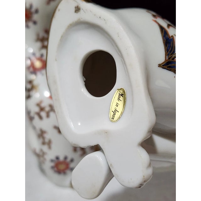 Charming **Vintage MCM Hand-Painted Porcelain Sitting Cat Figurines**, featuring two adorable feline figures with delicate...
