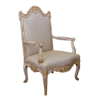 A Baronial French Regence Style Ivory Painted Open Armchair For Sale