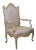 A Baronial French Regence Style Ivory Painted Open Armchair For Sale