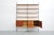 Pira shelving system made of teak, the shelves are 20 cm deep and the rails are 250 cm long, with two boxes. The...