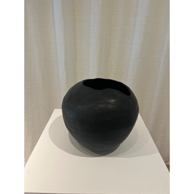 Dimensions: 9.5” diameter x 8.5” h Material: stoneware Finishing: unglazed Color: black Edition: one-of-a-kind