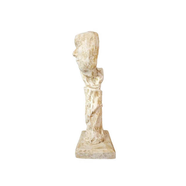 Embrace tranquility with this evocative Quiet Moment Face Mask in Hand Sculpture. This striking piece captures the essence...