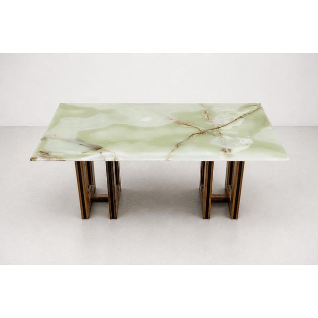 Italian design coffee-side table with Onyx top and steel frame decorated in walnut, 1970’sCondition Good, age related...
