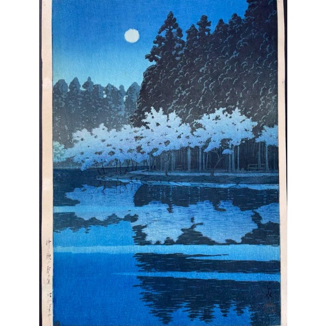 The Title of this Hasui Kawase Block Print is “Spring Night at Inogashira”. (Inokashira no haru no yoru) Ca. 1931 This is...