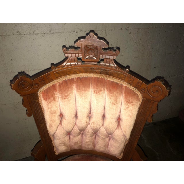 A pair of small armless slipper chairs that have been in the family for over 50 years. The wood is a combination of walnut...