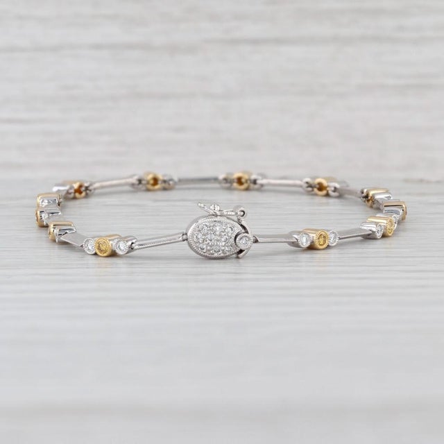 Gemstone Information: - Natural Diamonds - Total Carats - 0.42ctw Cut - Round Brilliant Color - F - G Clarity - VS2 -...