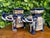Charming pair of vintage elephant-form planters featuring a rich cobalt blue glaze with cream and terracotta accents. The...