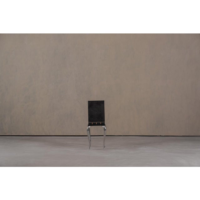 This vintage Lola Mundo chair/side table was designed by Philippe Starck in 1984 for the Italian manufacturer Driade. It...