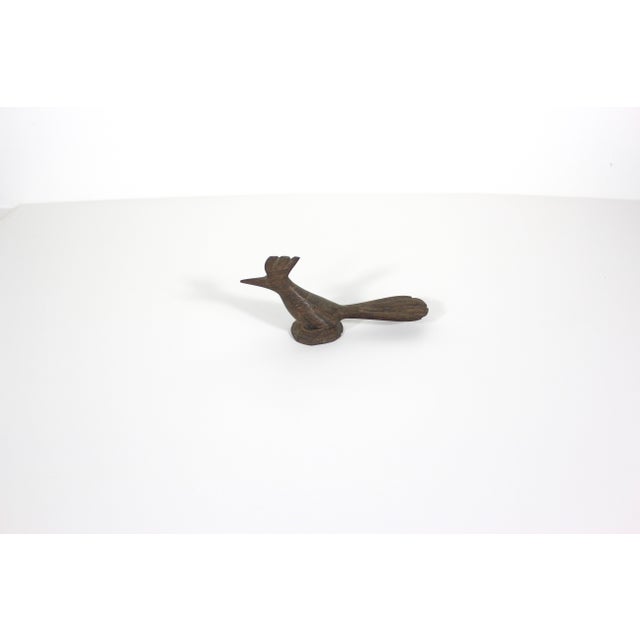 Mid century modern carved wood road runner. He would look great tucked into your shelf with some tropical plants or add...