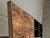 This spectacular rectangular wall mirror in gold-colored brass and black Murano glass is a stunning addition to any space...