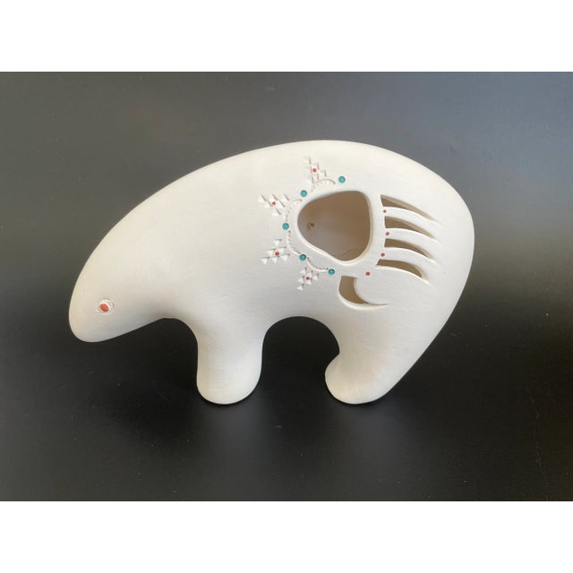 Acoma White Ware Pottery Spirit Bear by Elliot & Zelda Garcia. Relief small bear on one side; bear paw cut-out on the...