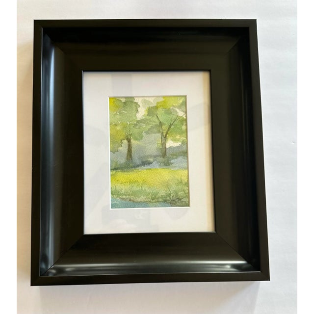 The two trees seem to have a relationship, set in a storybook setting. Signed, matted and framed and ready to hang.