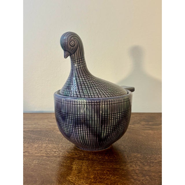 Charming vintage ceramic bird form lidded vessel executed in the manner of Aldo Londi for Bitossi. Featuring an elongated...