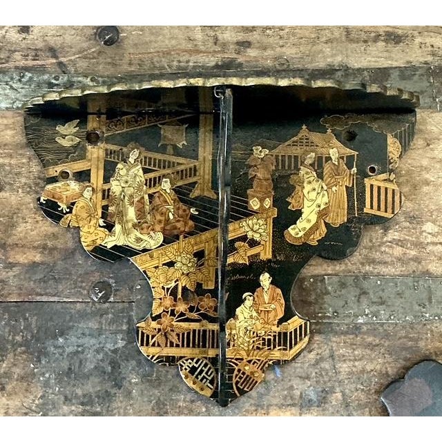 This elegant vintage Chinoiserie wall bracket is a masterpiece of decorative storytelling, finished in a rich black...