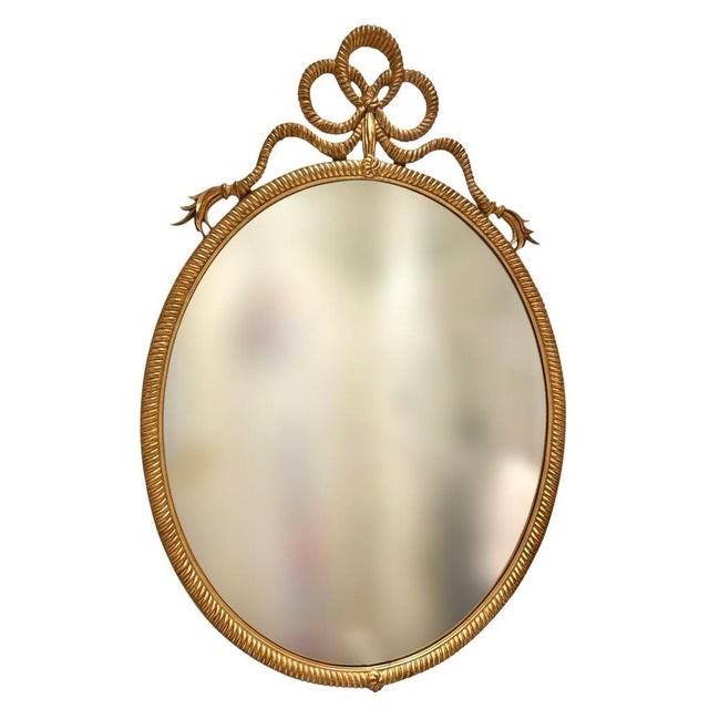 Stunning carvers guild rope bow mirror. Large wall mirror perfect for any room. Marked on backside