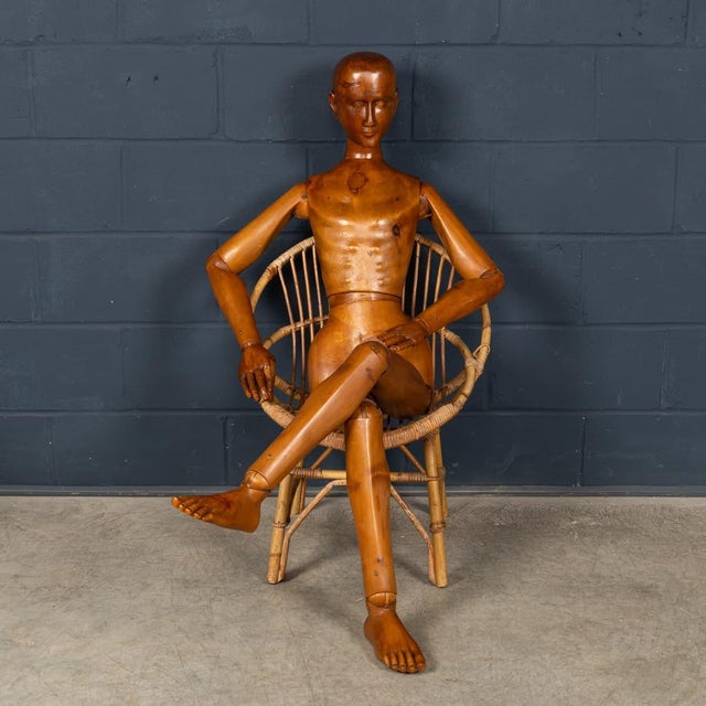 A rare and impressive life-sized carved wooden artist's mannequin dating to the early twentieth century, of continental...