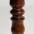 A circa 1900 French side table crafted in wood with an inlaid circular top supported by a pedestal base. The design...