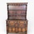 A substantial English Arts & Crafts oak kitchen pantry and display dresser by Christopher Pratt, showcasing beautifully...