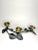 This free form, art nouveau heavy brass and pewter color carved candle holder holds three, (3), taper candles. It has a...