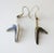 Vintage mid 20th century boomarang shape sterling silver earrings. Markings on back 925, Mexico JH makers mark. Contrast...