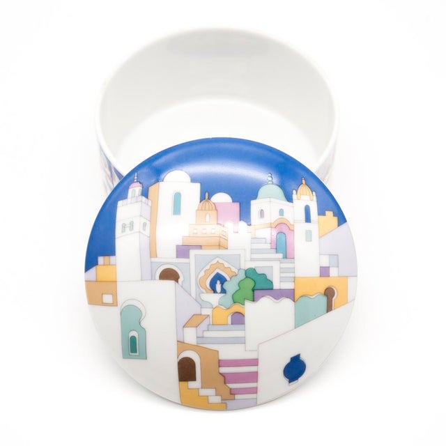 A decorative porcelain lidded box designed by kathy still for rosenthal studio-linie, titled "a visit to japan." the...